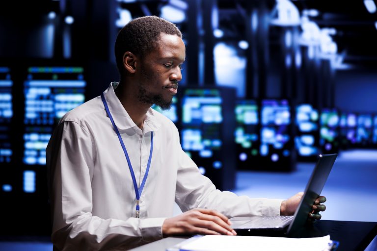 Man in front of a laptop